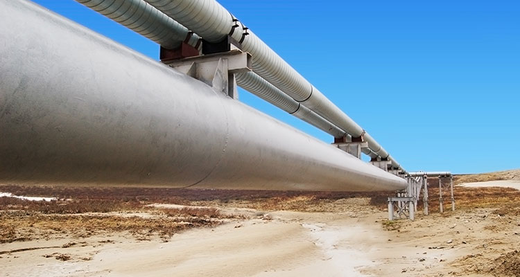 Pipes running through the desert.