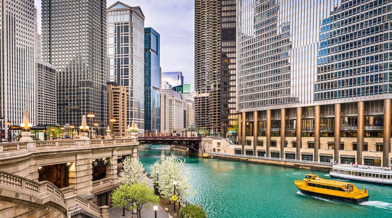 Image of Chicago, Illinois center showcasing the skyscraping and river running through to support natural gas ban article