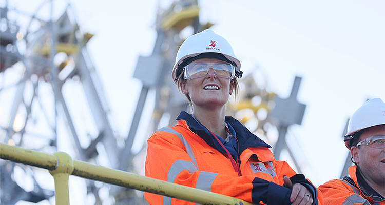 Dragon LNG worker in High vis overalls & white hard hat