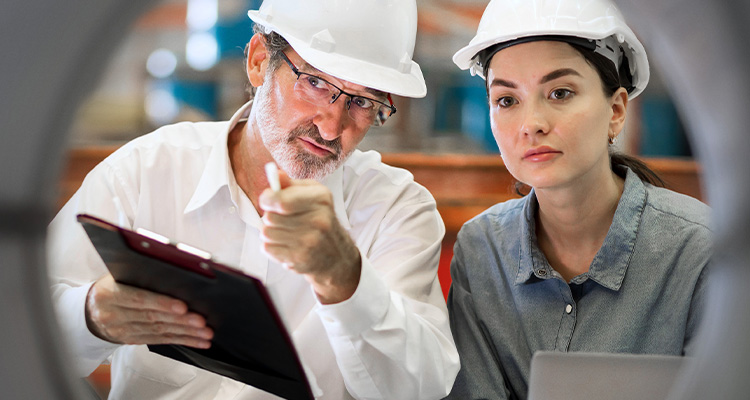 A new generation of engineers in a metal sheet factory. Studying work methods from supervisors or colleagues and studying by yourself be taught professionally