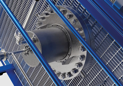 a heavy-duty industrial bolted flange connection joining a cylindrical drive shaft or housing to a larger machine frame, secured within a protective safety enclosure