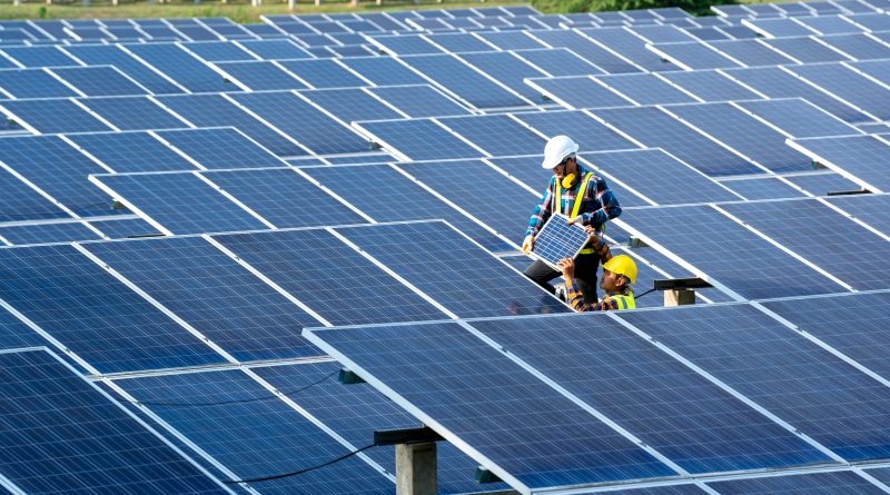 Large-scale solar farm operating under clear skies as solar generation surpasses coal in US electricity production.