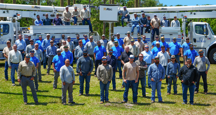 a large group photo of lineworkers from LCEC
