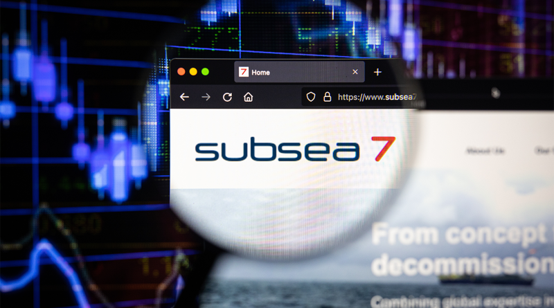 Subsea7 website displayed on a computer screen, featuring the company logo against a background of digital financial market data.