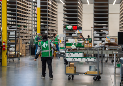 the interior of a large warehouse or fulfillment center